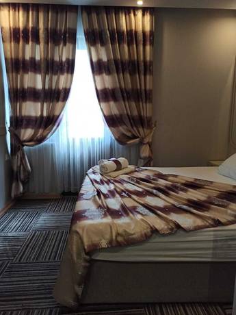Imagen de la habitación del Alya Suite Hotel. Foto 9