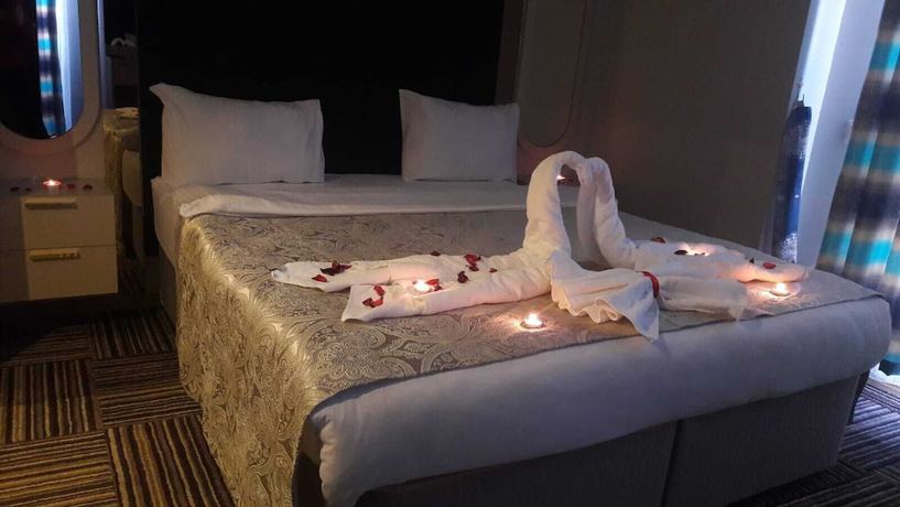 Imagen de la habitación del Alya Suite Hotel. Foto 11