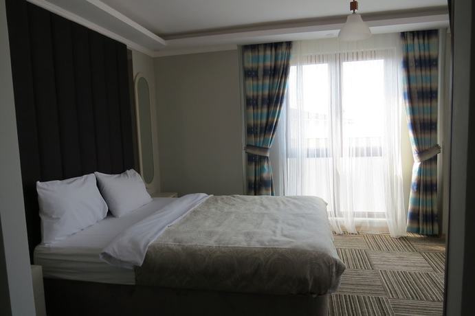 Imagen de la habitación del Alya Suite Hotel. Foto 13