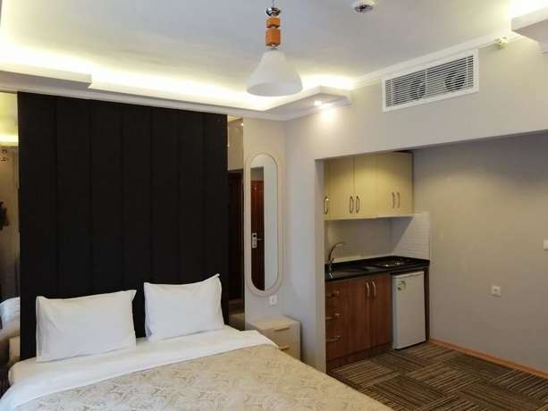 Imagen de la habitación del Alya Suite Hotel. Foto 17