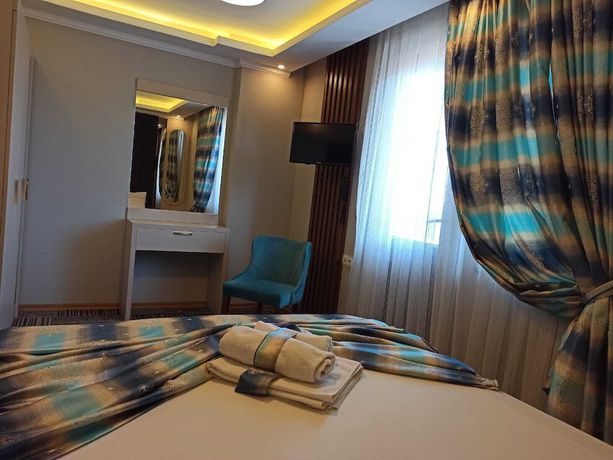 Imagen de la habitación del Alya Suite Hotel. Foto 18