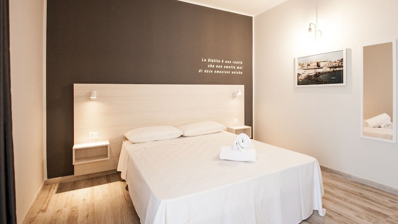 Imagen de la habitación del Amada Hotel Siracusa. Foto 10