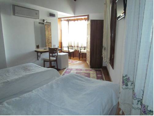 Imagen de la habitación del Amazon Petite Palace. Foto 4