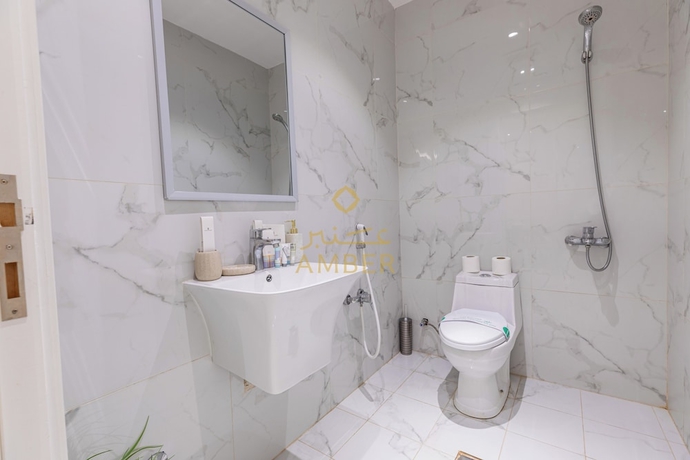 Imagen de la habitación del Amber Hospitality Al Qirawan. Foto 3