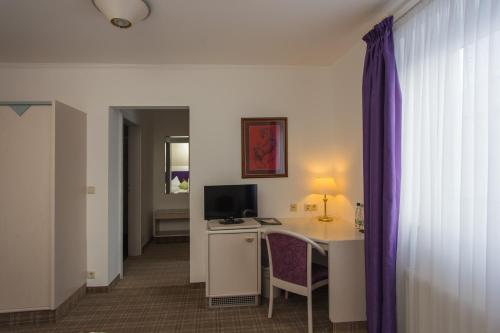 Imagen de la habitación del Ambiente Hotel garni. Foto 8