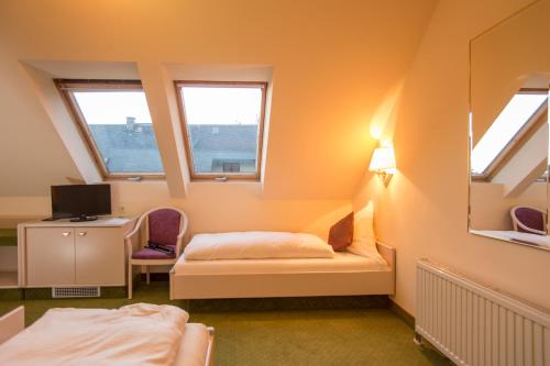 Imagen de la habitación del Ambiente Hotel garni. Foto 9