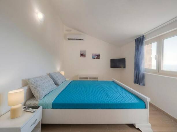 Imagen de la habitación del Amfora Family Apartments Rezevici. Foto 12