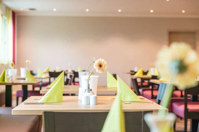 Imagen del bar/restaurante del Ammi Hotel Garni. Foto 4