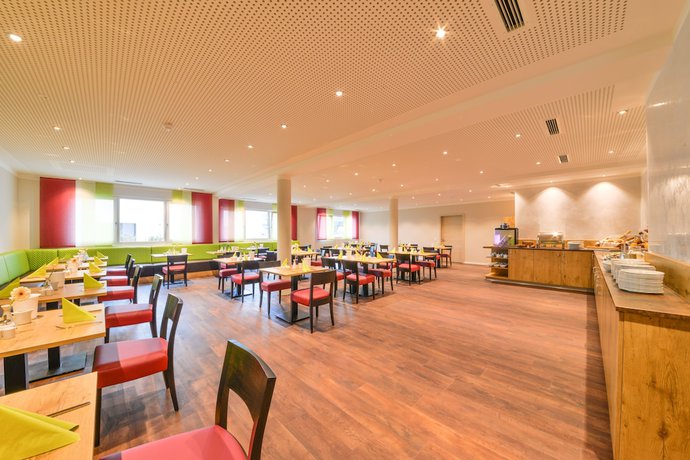 Imagen del bar/restaurante del Ammi Hotel Garni. Foto 7