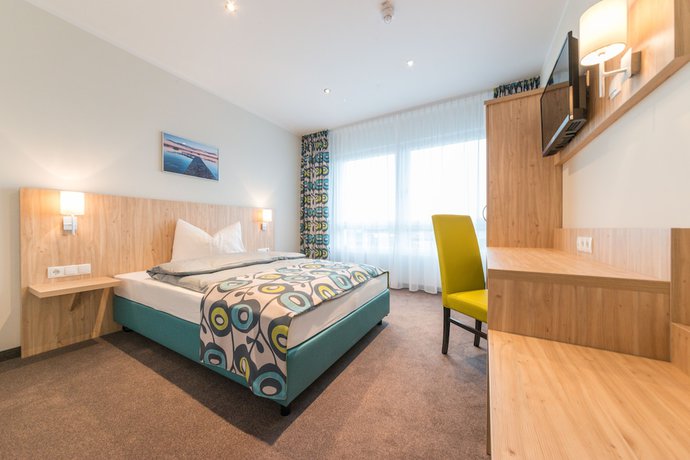 Imagen de la habitación del Ammi Hotel Garni. Foto 12