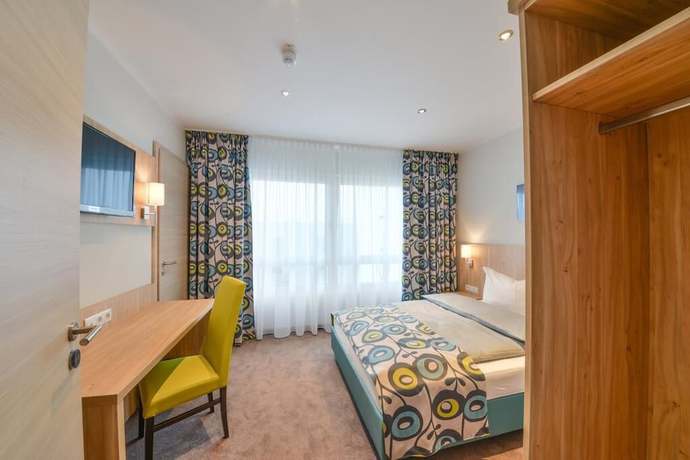 Imagen de la habitación del Ammi Hotel Garni. Foto 13