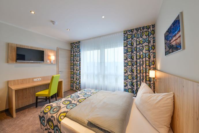 Imagen de la habitación del Ammi Hotel Garni. Foto 14