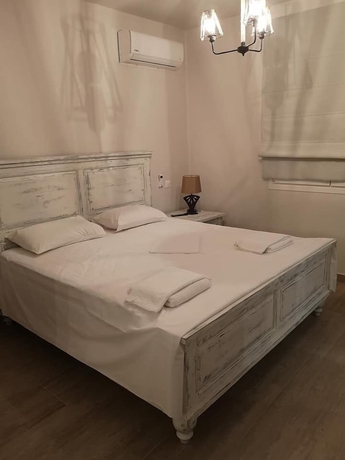 Imagen de la habitación del Ammos Luxury Suites. Foto 2