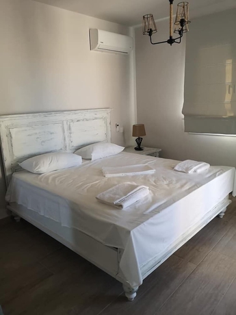 Imagen de la habitación del Ammos Luxury Suites. Foto 4
