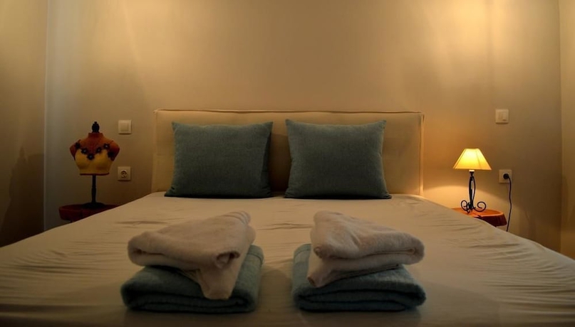 Imagen de la habitación del Ammos Luxury Suites. Foto 10