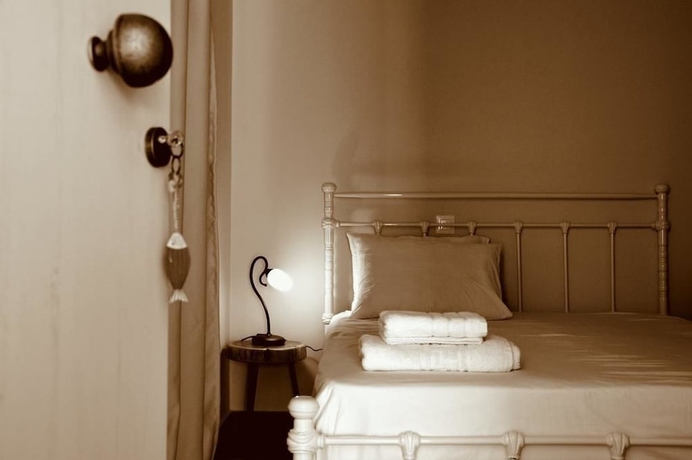 Imagen de la habitación del Ammos Luxury Suites. Foto 11