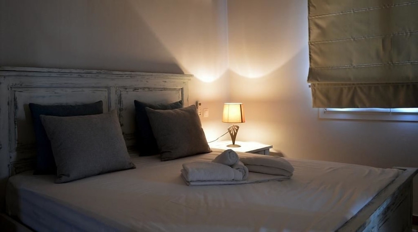 Imagen de la habitación del Ammos Luxury Suites. Foto 12