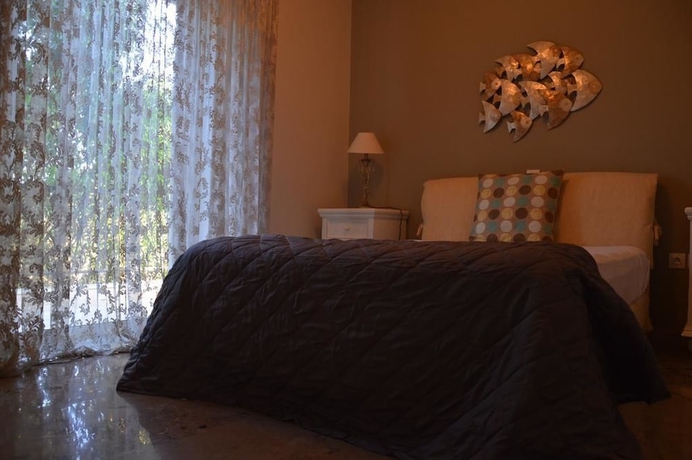 Imagen de la habitación del Ammos Luxury Suites. Foto 13