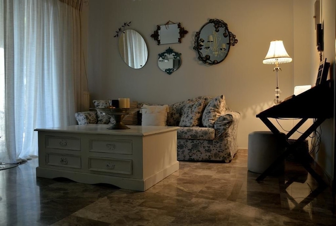 Imagen de la habitación del Ammos Luxury Suites. Foto 15
