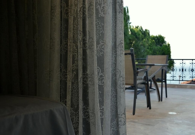 Imagen de la habitación del Ammos Luxury Suites. Foto 17