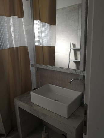 Imagen de la habitación del Ammos Luxury Suites. Foto 19