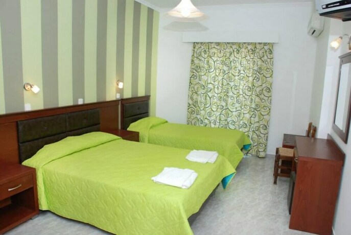 Imagen de la habitación del Amoudi Studios Apartments Hotel. Foto 20