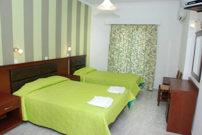 Imagen de la habitación del Amoudi Studios Apartments Hotel. Foto 23