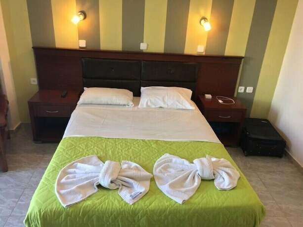 Imagen de la habitación del Amoudi Studios Apartments Hotel. Foto 30