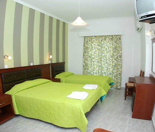 Imagen de la habitación del Amoudi Studios Apartments Hotel. Foto 31
