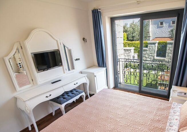 Imagen de la habitación del Amour Alacati Butik Otel. Foto 17