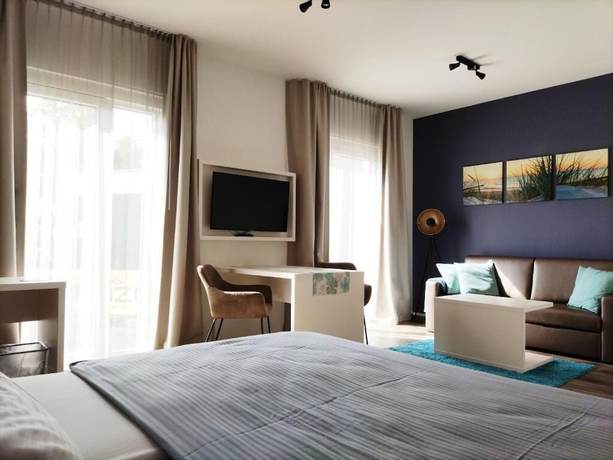 Imagen de la habitación del Amper Art Hotel. Foto 11