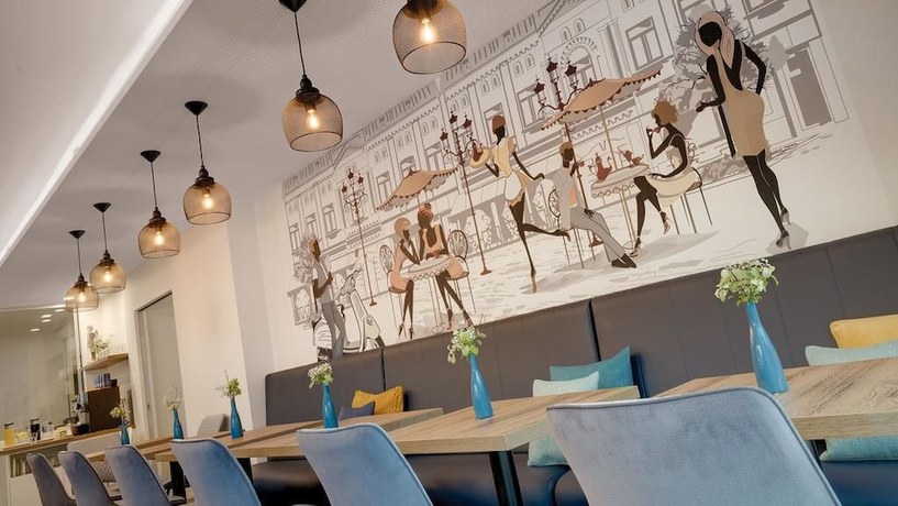 Imagen del bar/restaurante del Amper Art Hotel. Foto 2