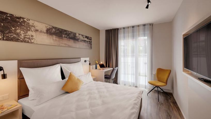 Imagen de la habitación del Amper Art Hotel. Foto 17