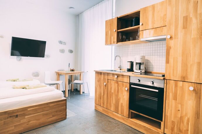 Imagen de la habitación del Amtshaus Gut H&uuml;gle Boutique Apartments. Foto 18