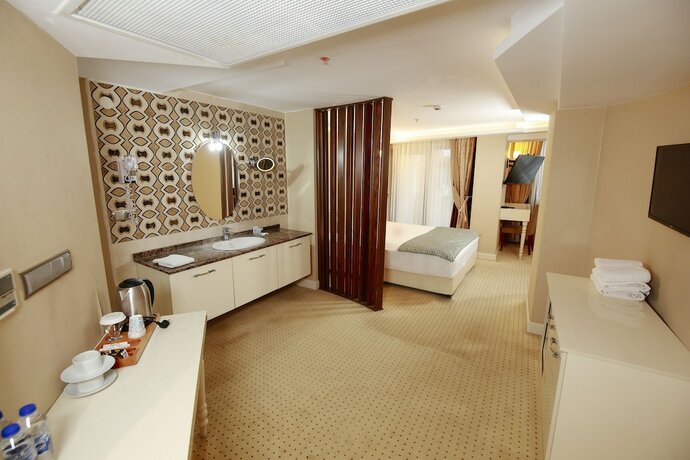 Imagen de la habitación del Anafarta Otel. Foto 18