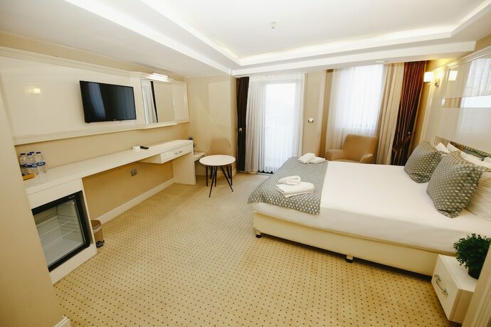 Imagen de la habitación del Anafarta Otel. Foto 19