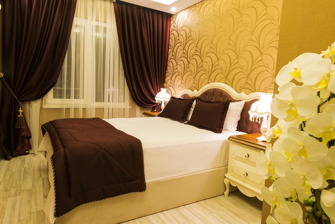 Imagen de la habitación del Andalouse Elegante Suite Hotel. Foto 6