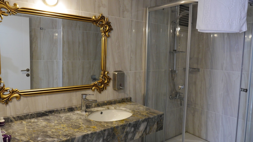 Imagen de la habitación del Andalouse Elegante Suite Hotel. Foto 9