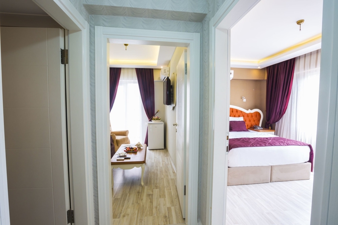 Imagen de la habitación del Andalouse Elegante Suite Hotel. Foto 10