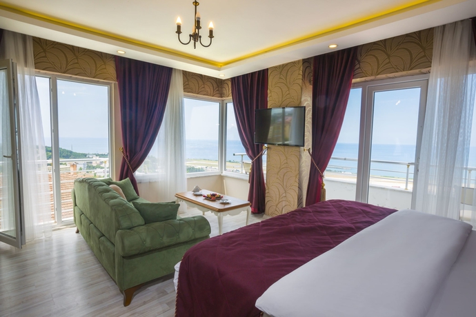 Imagen de la habitación del Andalouse Elegante Suite Hotel. Foto 11