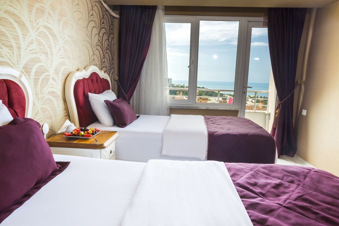 Imagen de la habitación del Andalouse Elegante Suite Hotel. Foto 12