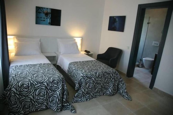 Imagen de la habitación del Anemos Hotel. Foto 5