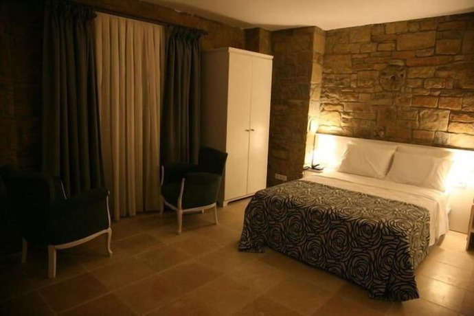 Imagen de la habitación del Anemos Hotel. Foto 10