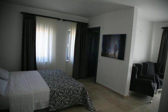 Imagen de la habitación del Anemos Hotel. Foto 11