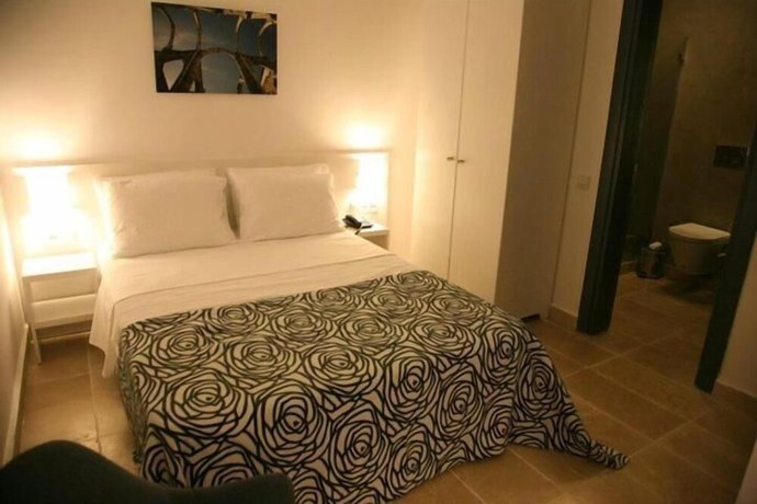 Imagen de la habitación del Anemos Hotel. Foto 12