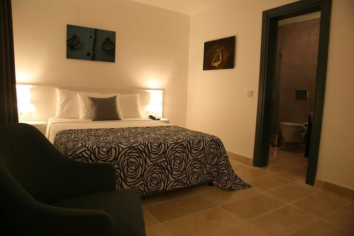 Imagen de la habitación del Anemos Hotel. Foto 14