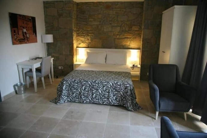 Imagen de la habitación del Anemos Hotel. Foto 15