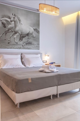 Imagen de la habitación del Anemos Rooms and Apartments. Foto 13