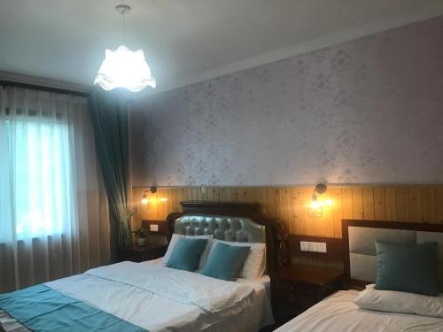 Imagen de la habitación del Anji Mingquan Hotel. Foto 8