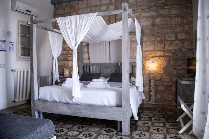 Imagen de la habitación del Antico Mondo Rooms and Suites. Foto 7
